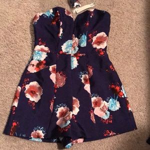 Runs big- NWT Floral Romper